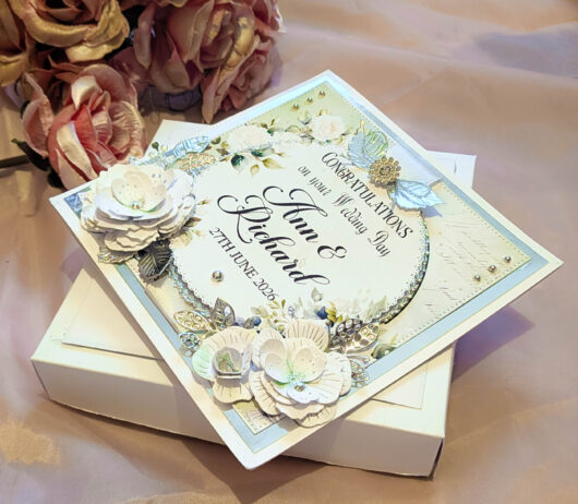 Handmade boxed wedding card with silver mirror cardstock and lace detail.