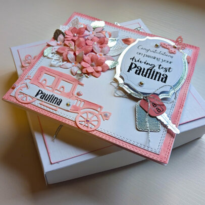 Handmade personalised pink luxury boxed driving test congratulations card shown with decorated matching presentation gift box.
